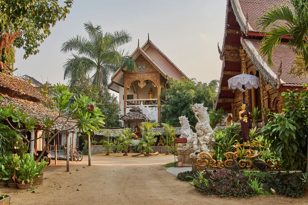 Wat Mahawan temple in Chiang Mai with its ornate white chedi